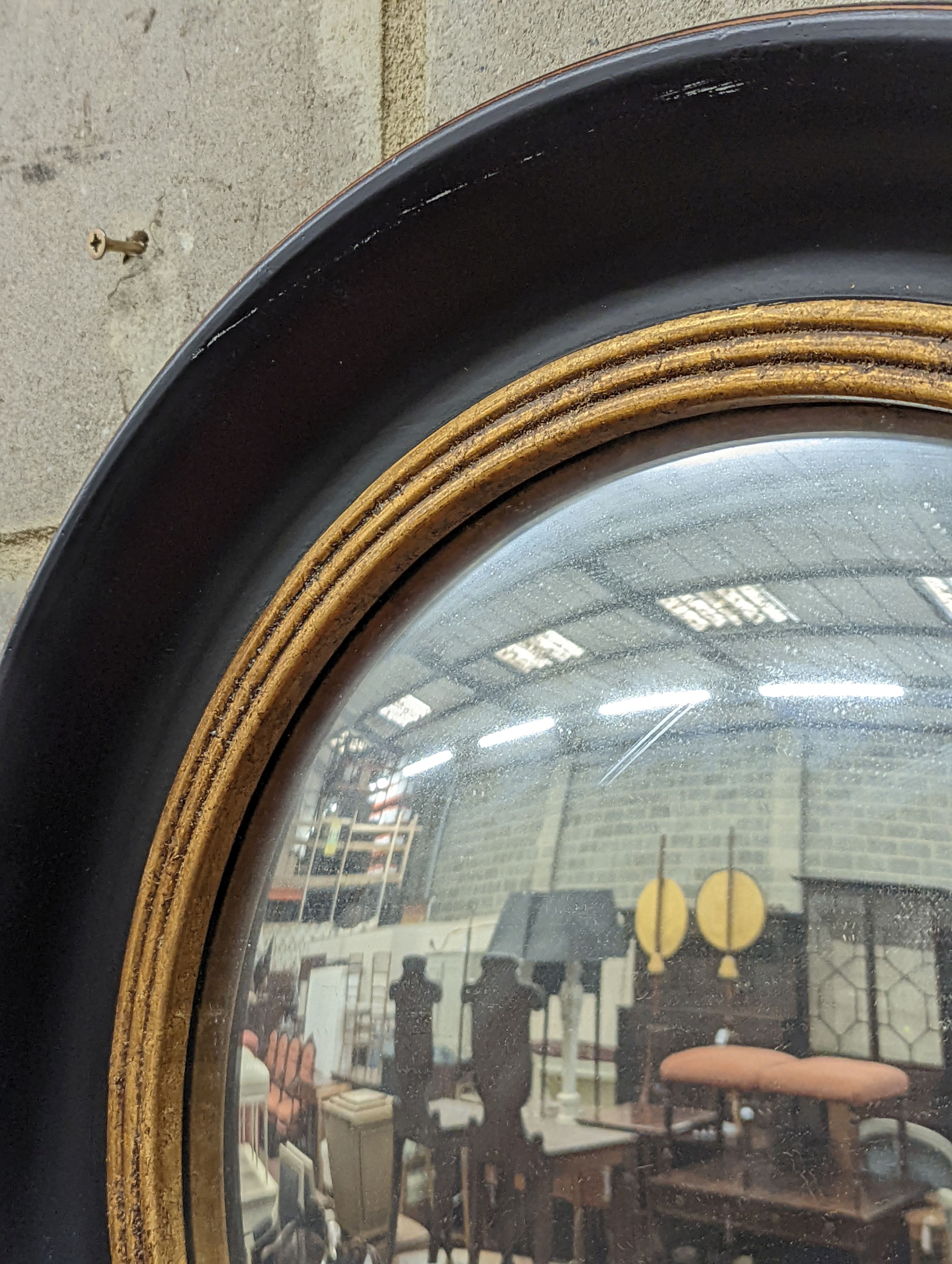 A Regency style circular convex wall mirror, diameter 53cm